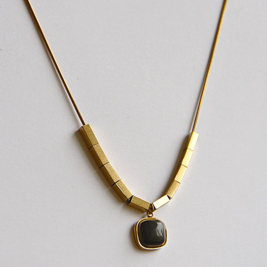 Sleek Gold-Tone Beaded Bar & Black Agate Pendant Necklace