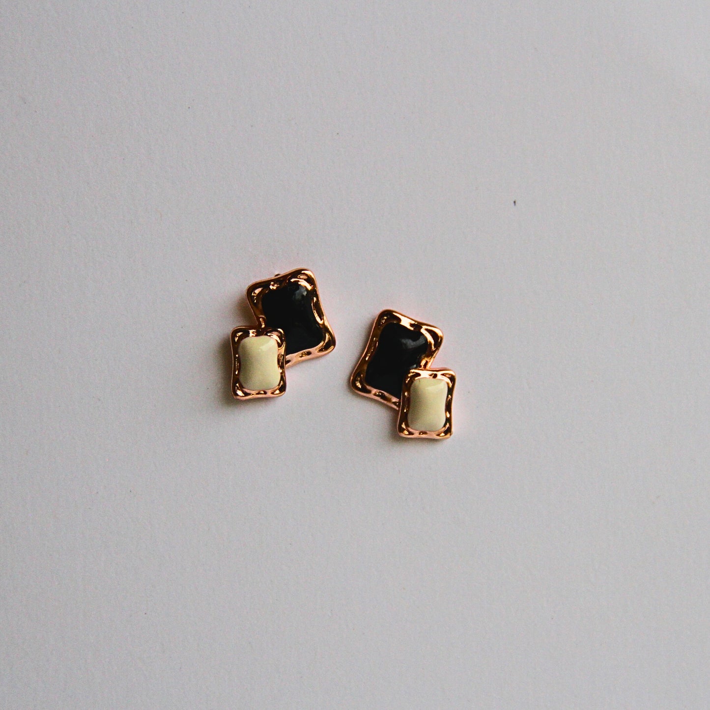 Two-Tone Enamel Studs in Gold Frame