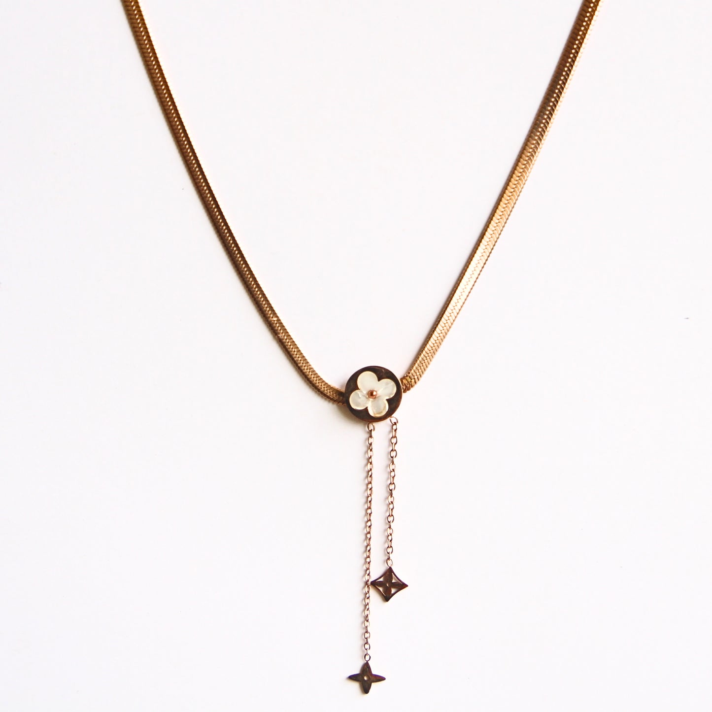 Chic Gold Tone Snake Chain Necklace with Clover Medallion & Dangles
