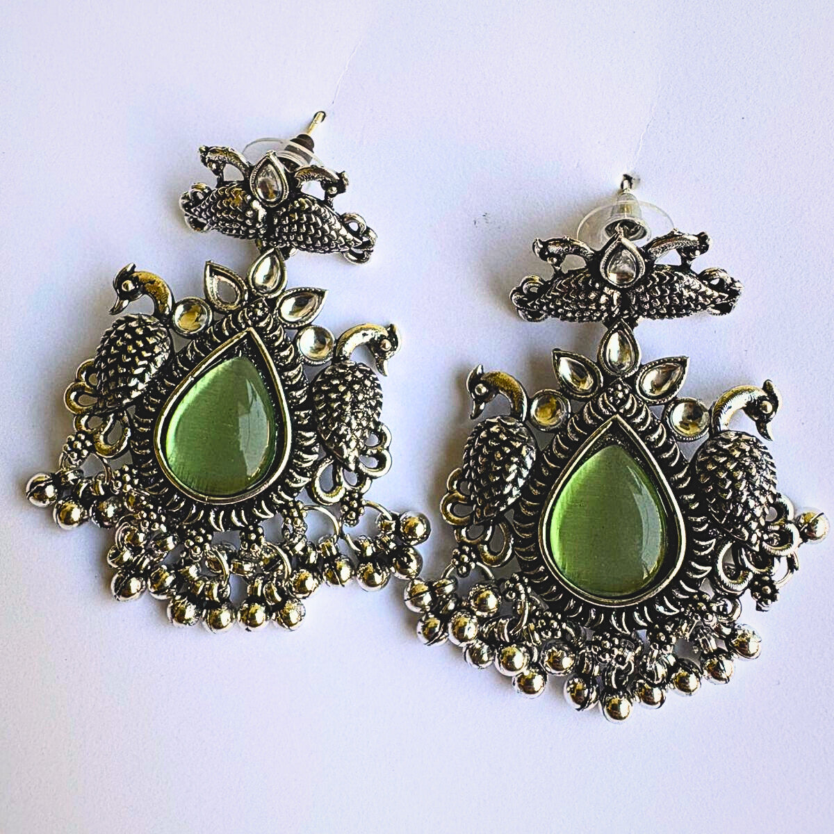 Dual green Peacock Oxidized Silver Earrings – NainNaksh Edit