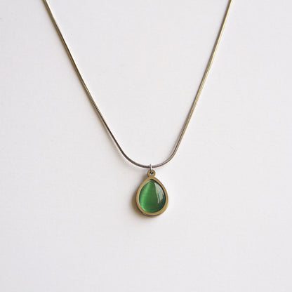 Minimalist Silver Tone Necklace with Luminous Green Teardrop Pendant