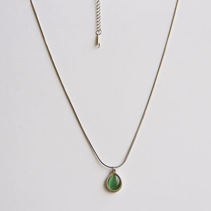 Minimalist Silver Tone Necklace with Luminous Green Teardrop Pendant