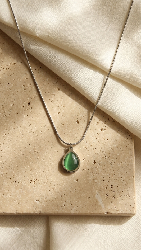 Minimalist Silver Tone Necklace with Luminous Green Teardrop Pendant