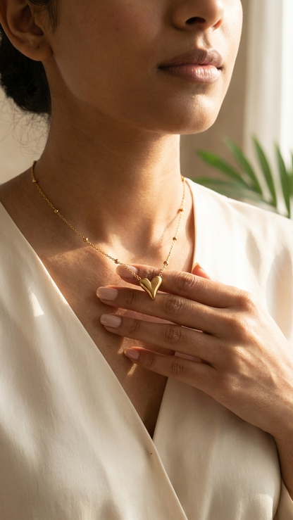 Minimalist Gold Tone Chain with Sculpted Heart Pendant