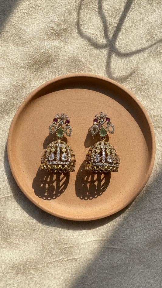 Royal Pastel AD Jhumka Earrings – Antique Gold Finish