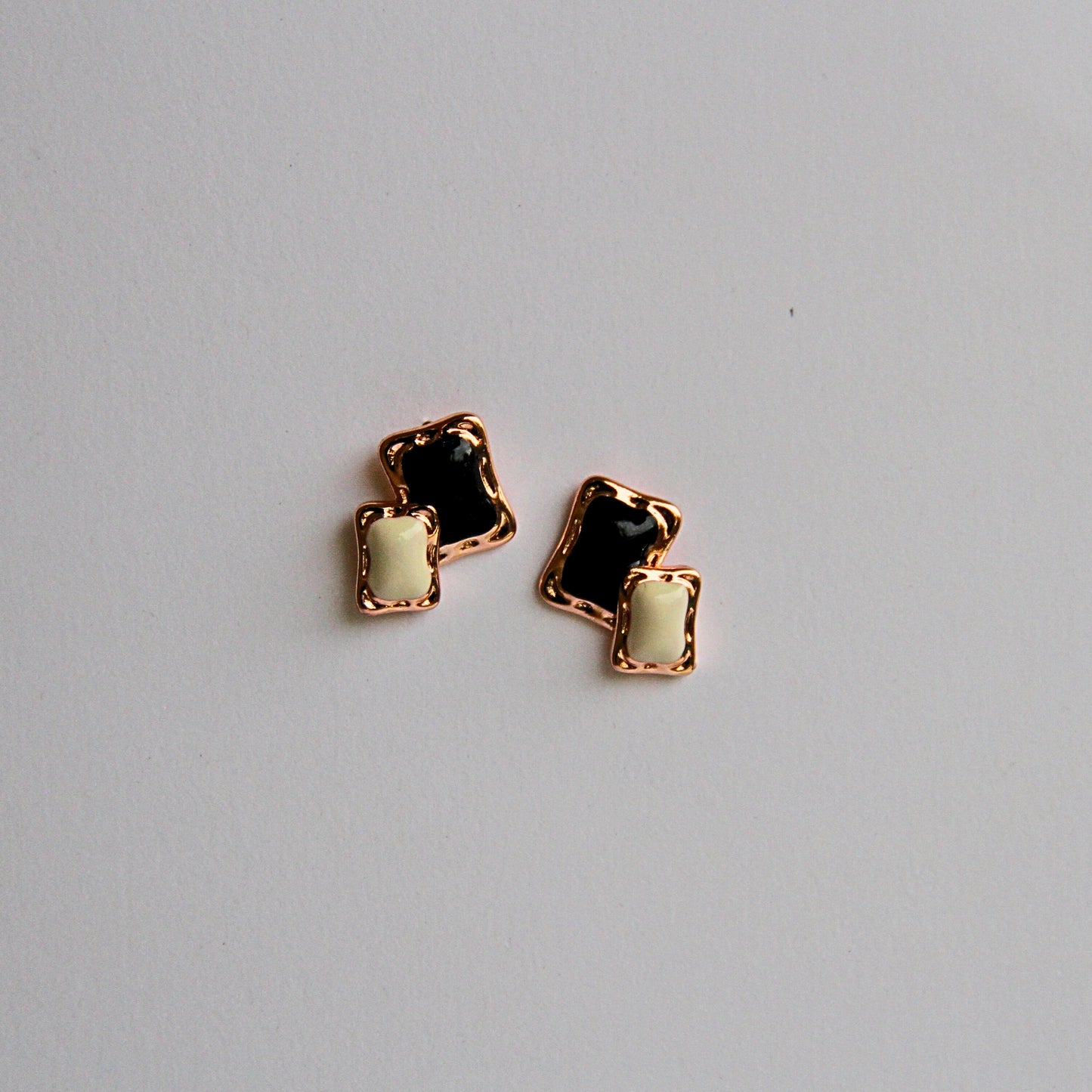 Two-Tone Enamel Studs in Gold Frame